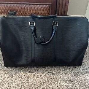 Elegant Black Epi Leather Louis Vuitton Keepall duffle bag